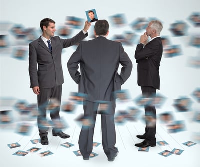 Stylish businessmen working together holding profile picture