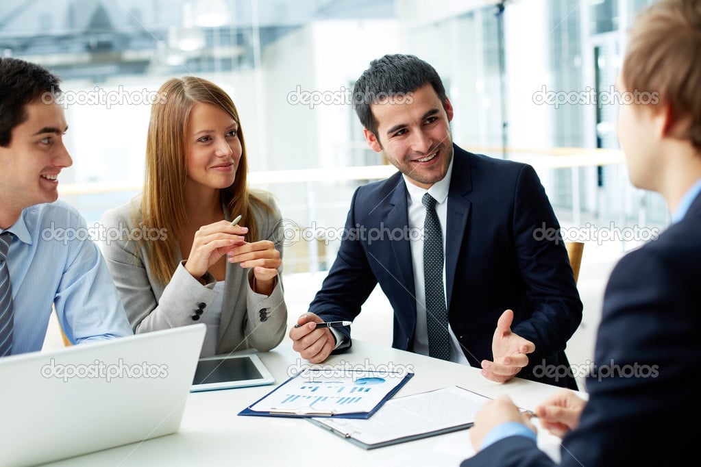 depositphotos_21186915-stock-photo-business-partners-discussing-documents.jpg