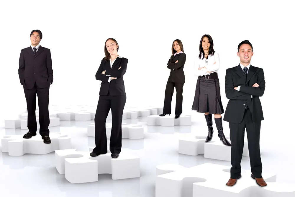 business teamwork on puzzle pieces over a white background